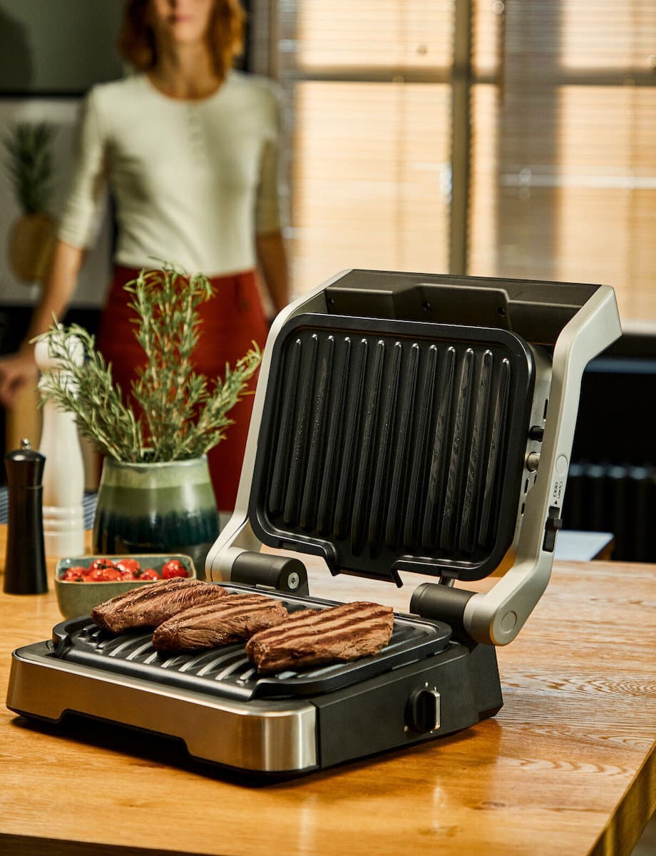 Tefal Optigrill 4-in-1 Επιτραπέζια Ηλεκτρική Ψησταριά Λείας και Αυλακωτής Πλάκας 2100W Ανοξείδωτη με Καπάκι και Ρυθμιζόμενο Θερμοστάτη GC774D30 3